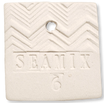 Square ceramic test tile made out of Happycozygoods Sea Mix 6 pottery clay, with zigzag pattern with 'SEAMIX 6' stamped on it, on a white background. 