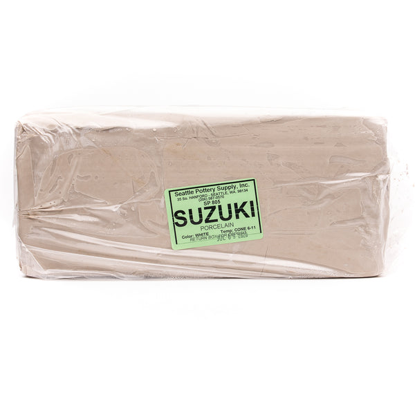A packaged block of Suzuki porcelain, with the Happycozygoods brand name visible on the label, wrapped in plastic.